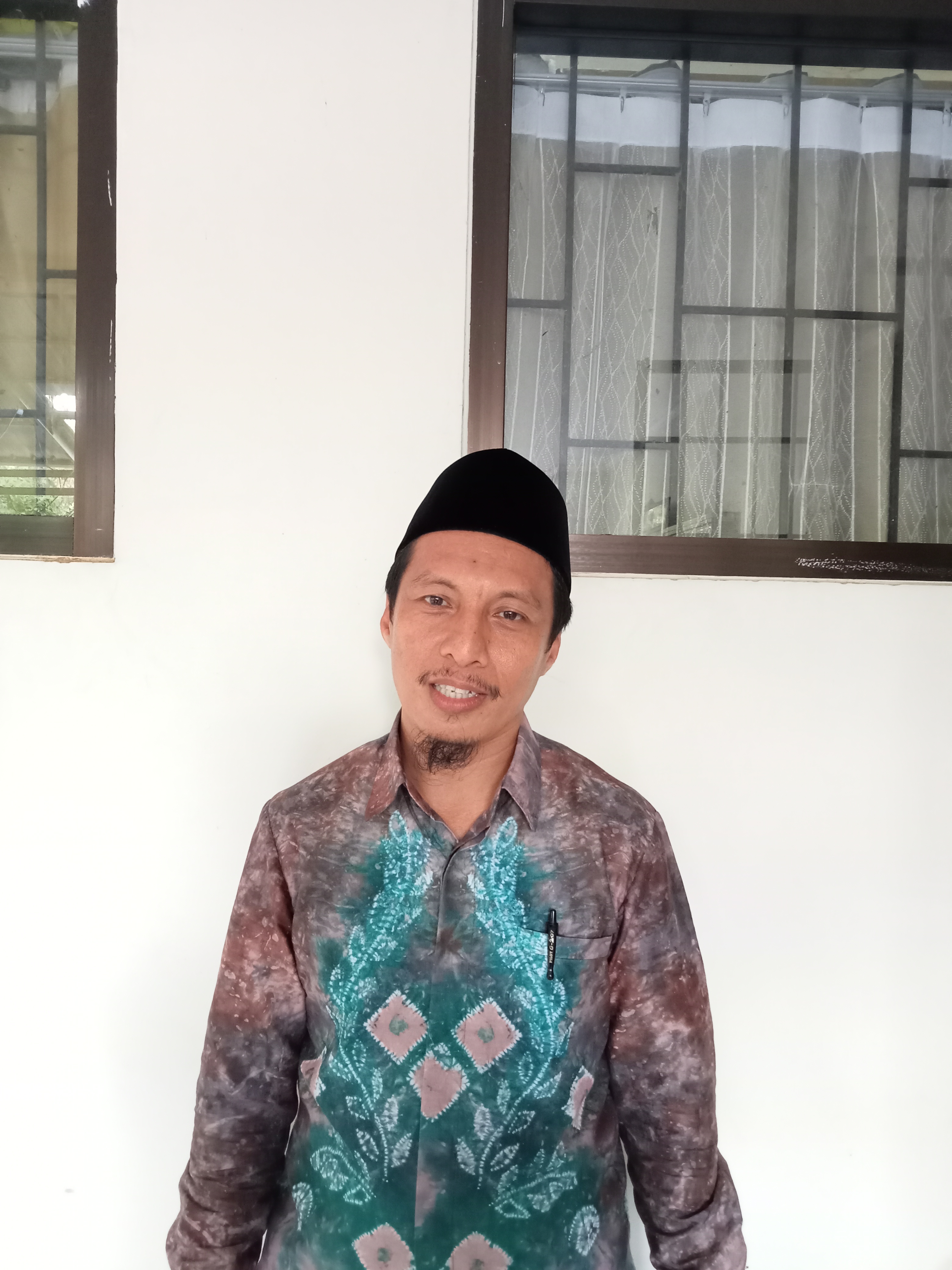 Touku Umar, S.Hum., M.I.P.